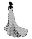 Black silhouette of young girl in wedding or evening long lace dress with train standing she stands with her back to the viewer fa Royalty Free Stock Photo